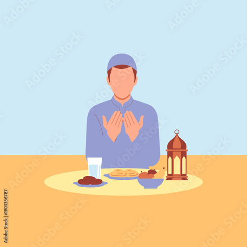 Man praying before iftar meal.