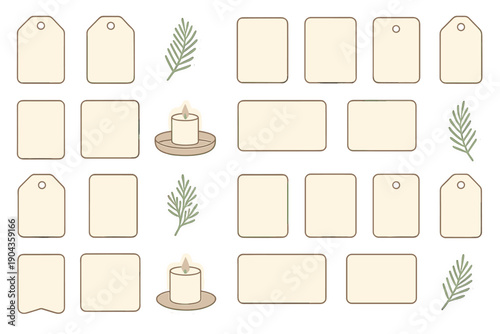 Tags and candles arranged on a table with green leaves for crafting or decorating ideas
