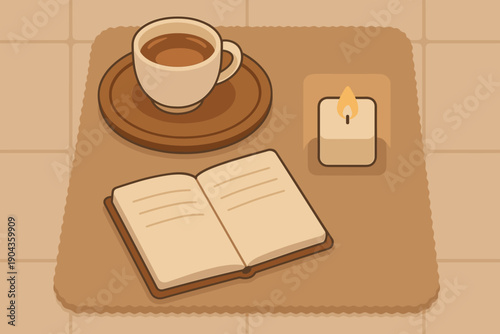 Warm drink sits next to an open book and candle on a brown mat in a cozy setting