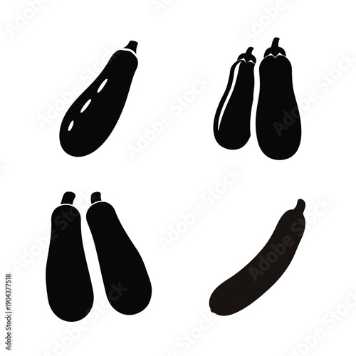 Four distinct illustrations of black silhouetted eggplants in varying orientations.