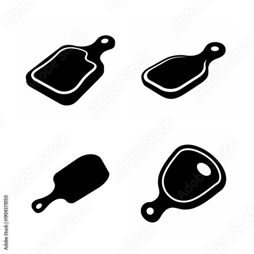 Four different types of kitchen utensils used for grilling and cooking meats.