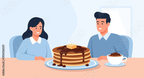Couple enjoying a breakfast of pancakes and coffee