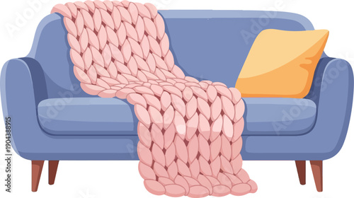 Cozy blue sofa with a thick pink knit blanket and orange pillow