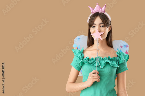 Young woman in fairy costum...