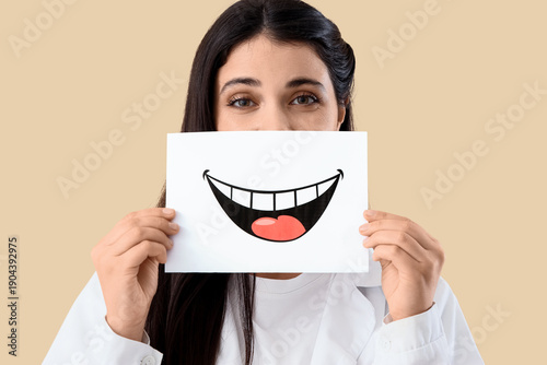 Female dentist with paper s...