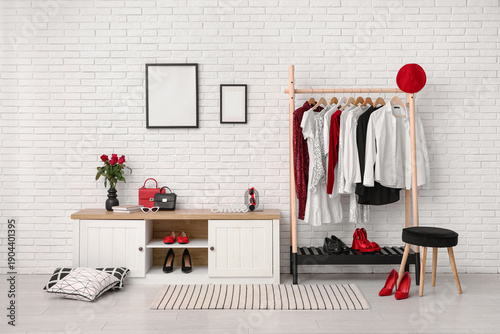 Rack with clothes and sideb...