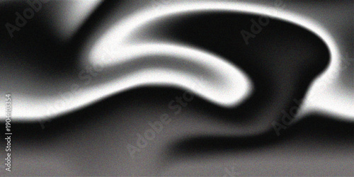 Luxury abstract black and blue silk background with smooth flowing satin waves and light effect curves for a soft textile texture backdrop