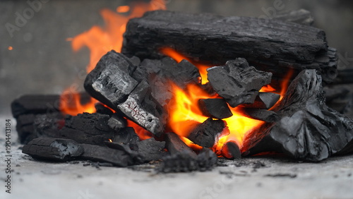 Картината върху платно Burning Charcoal Briquettes Close Up View for BBQ