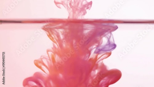 Subtle Color Transition Highlighting the gentle interplay of pastel hues and the luminous quality imparted by the dawn glow on the ink?s movement.