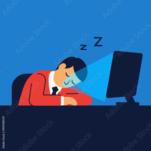 Person sleeping with head on desk in front of a computer monitor.