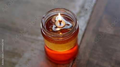 Konstfotografi Homemade Candle in Jar with Flame Burning Brightly