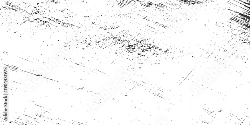 An abstract grunge background featuring a vintage black ink splat on a rough textured paper surface with a dirty paint splash effect and a dusty film frame design