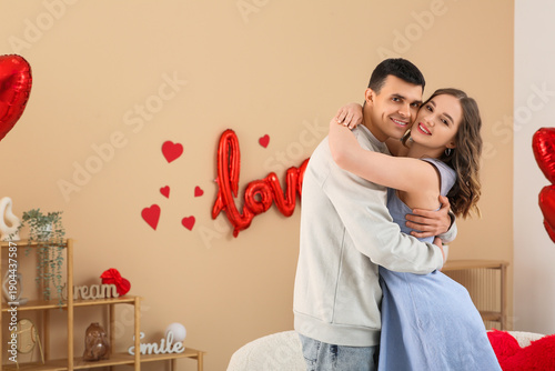 Young couple at home on Val...
