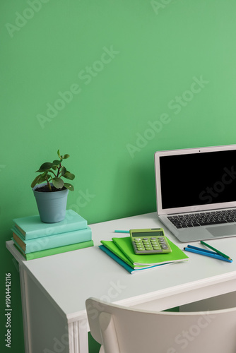 Modern laptop, stationery a...