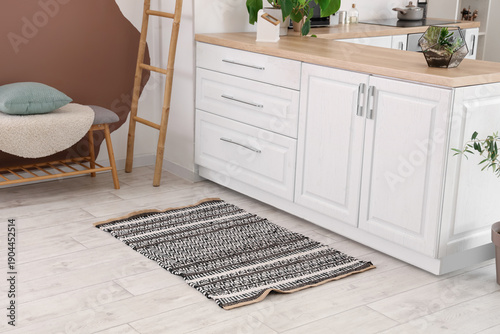 Stylish carpet on floor in ...