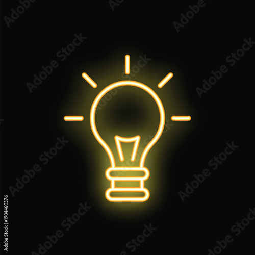 Bright yellow neon lightbulb glowing on a black background representing the concept of a new idea