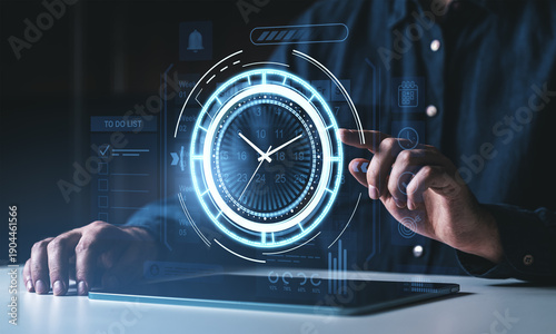 Futuristic digital time management interface with glowing clock and calendar on virtual screen concept background controlled by a person using a tablet.