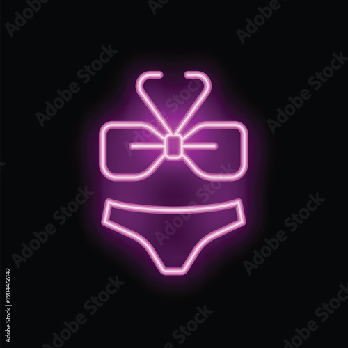 Glowing neon sign depicting a two piece swimsuit, perfect for conveying concepts of summer, vacation, and fun