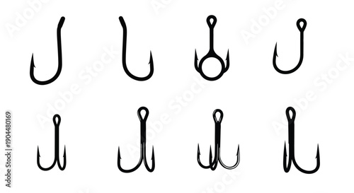 Variety of fishing hooks displayed in a black and white arrangement