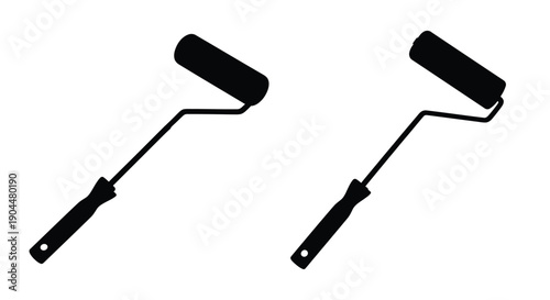 Two paint rollers in black silhouette against a white background