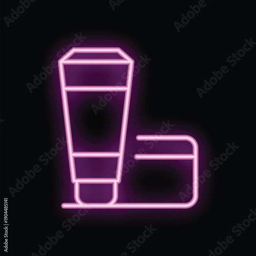Neon sign depicting a tube of lipstick or other cosmetic next to a credit card, symbolizing online shopping and beauty purchases