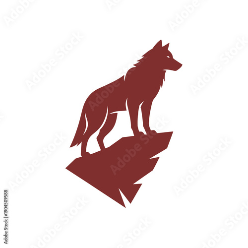 Majestic Wolf Silhouette Standing on Rocky Outcrop, Symbol of Wildness and Freedom
