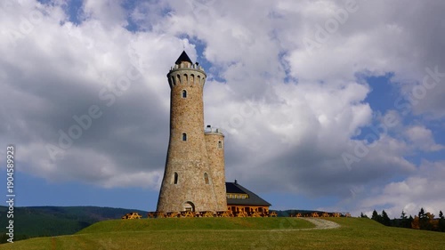 Dalimil Lookout Tower on Vetrov Hill against backdrop of moving clouds Czech Republic. timelapse