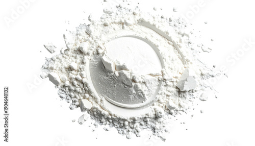 Overhead view of a circular pile of white powder on a dark background