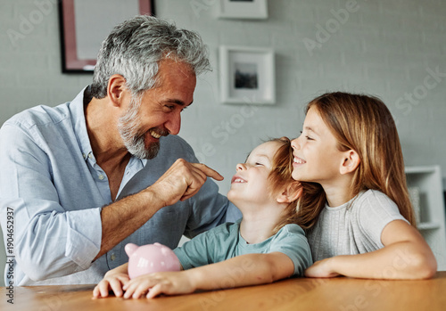 Wallpaper Mural Grandparent grandfather And His Grandson and granddaughter Putting Coin Money In Piggybank  At Home. Personal Savings, Bank Safety And Financial Investments Concept Torontodigital.ca