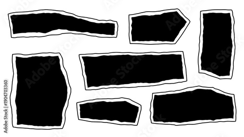 Collection of black irregular shapes on white background