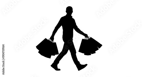 Man walking with multiple shopping bags in both hands