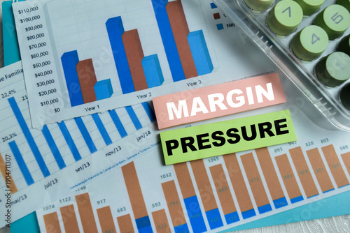 Foto Concept of margin pressure write on sticky notes isolated on Wooden Table