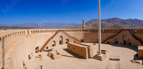The large fortification, also known as the fortress or fort of Nizwa.
