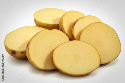 fresh raw potato slices arranged on a pure white background