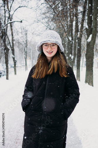 young woman in winter forest