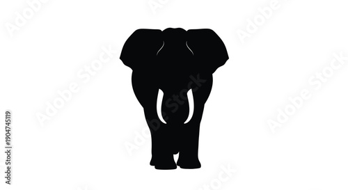 A striking black silhouette of a majestic elephant facing forward silhouette