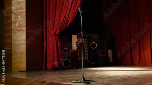 Vintage Wooden Stage with Red Theater Curtains and Retro Microphone Stand