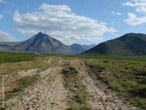 mountain landscape with blue sky and clouds