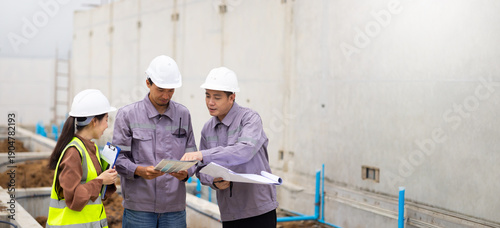 Unity and teamwork. Professional Mechanical Engineer team. Ethnic diversity worker people, Success teamwork. Group of professional construction engineering people wearing hardhat safety helmet meeting