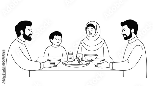 A family of four shares a meal together at a dining table
