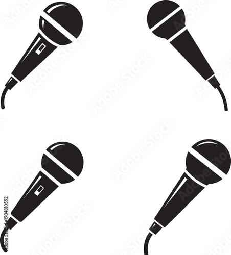 Four black microphones arranged in a square formation