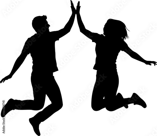 Couple jumping in mid-air for joyful high five