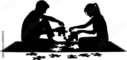 Couple sitting on the floor solving a jigsaw puzzle silhouette