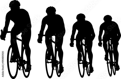 Silhouette of a group of four professional cyclists racing in a line