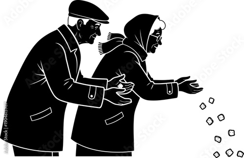 Silhouette of an elderly couple feeding birds with bread crumbs