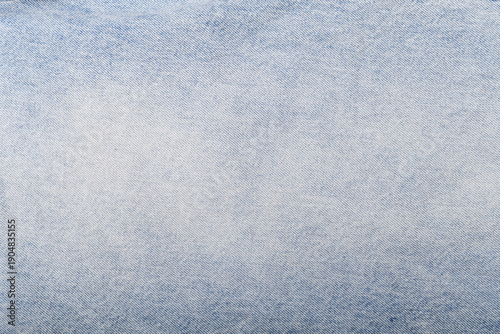 Light blue denim texture with a soft gradient and fine weave.