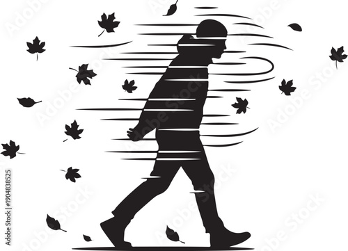 Silhouette of a person walking in the autumn wind