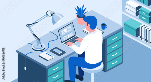 A person working on a computer at a desk in a modern office setting