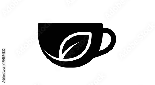 Black teacup with leaf design