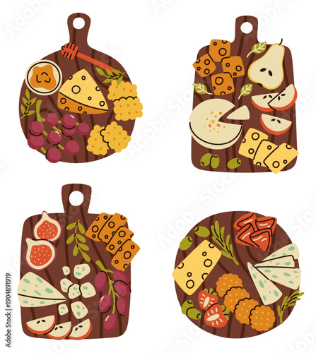 A set of cheese boards with appetizers. Cheese slices, fruit, olives, grapes. Festive appetizers.